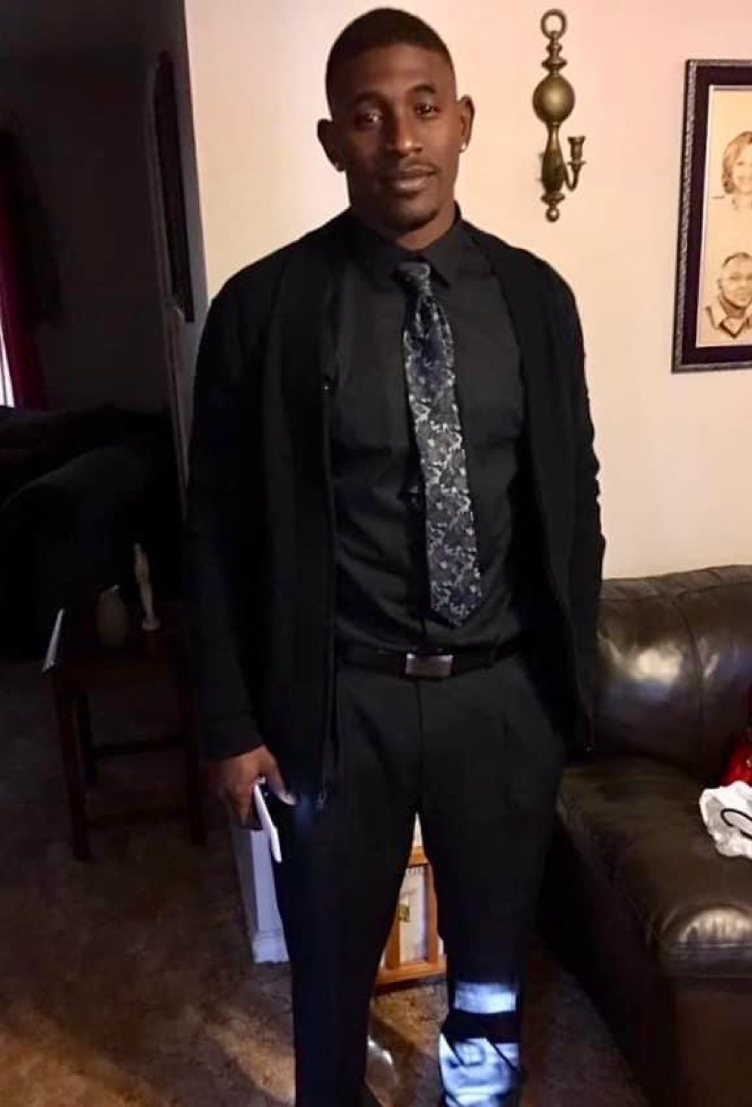 Cartez dressed formally